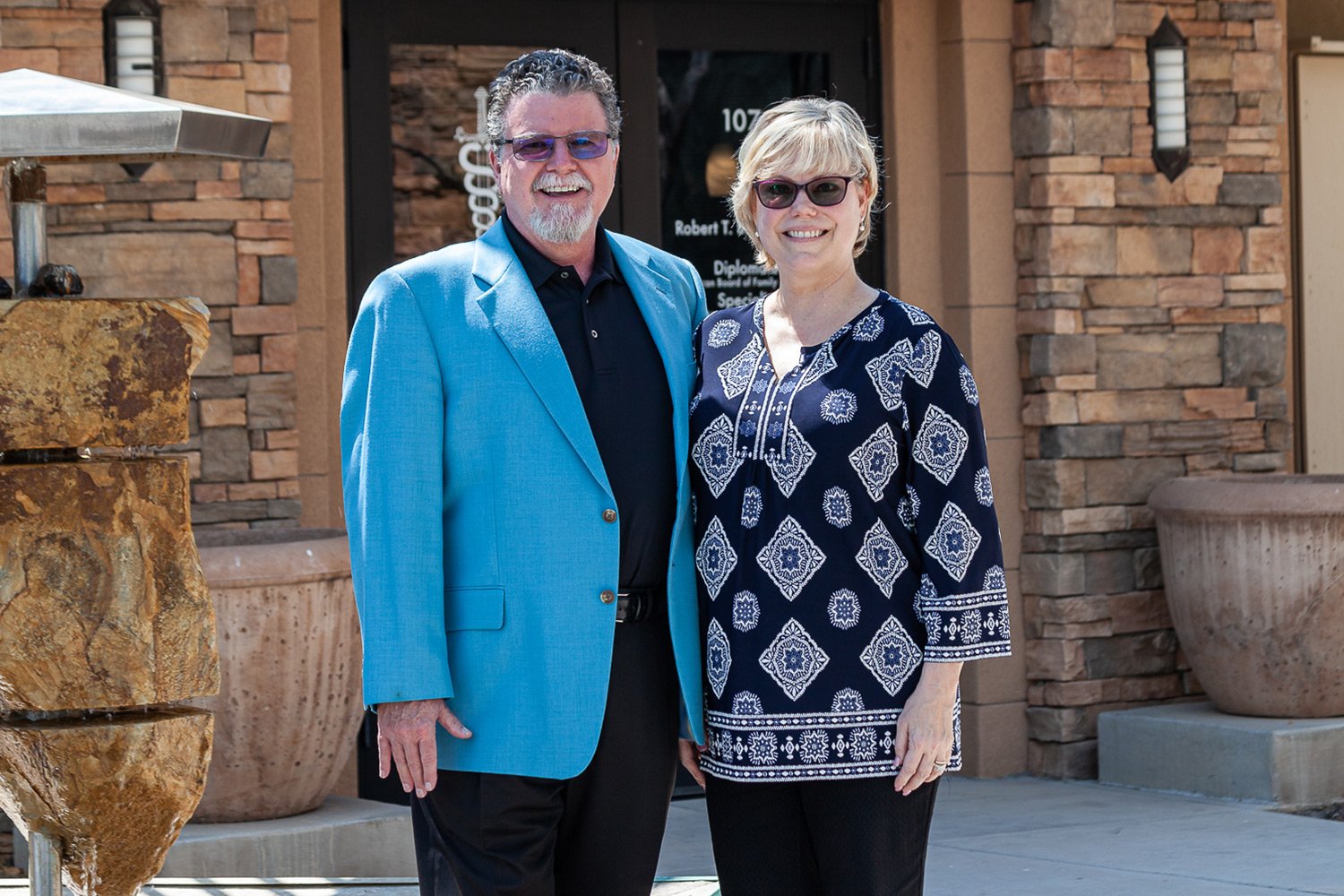 dr bailey with wife outside of family practice
